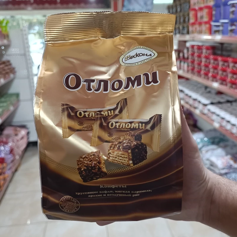 ویفر روسی اوتلوم پاکتی360 گرم با لایه های ویفر ترد مغزدار با روکش شکلاتی