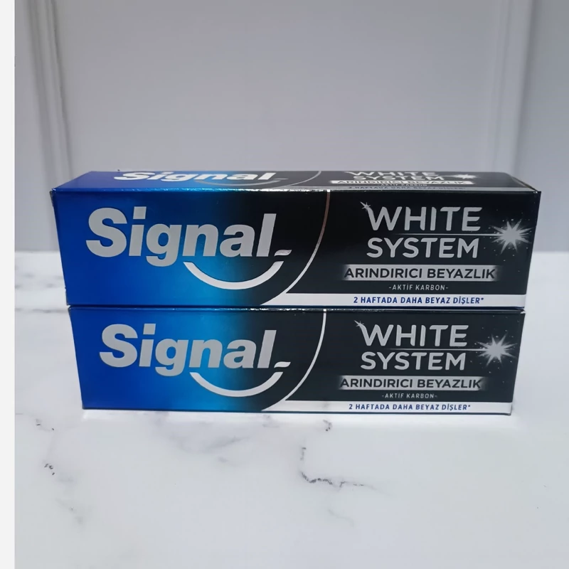خمیر دندان زغالی سفید کننده Signal سیگنال سری white system وایت سیستم  حجم 75 میل ( از بین برنده آلودگی و کثیفی دندان)