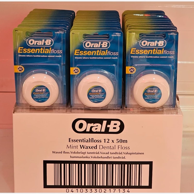 نخ دندان اورال بی اصل مدل Essential Floss با رایحه نعنا طول 50 متر